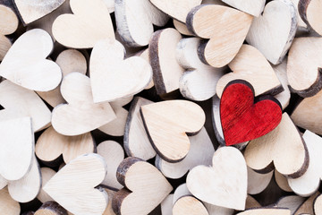 Obraz premium Background with wooden hearts, place for text.