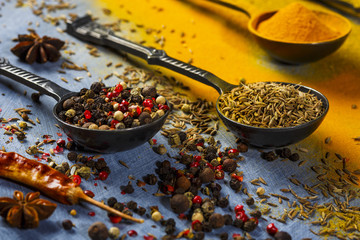 Wooden table of colorful spices.