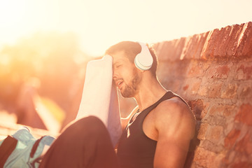 sweaty man on training break