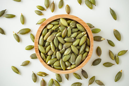 Pumpkin Seeds On White Background, Top View