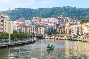 bilbao riverbank views on sunny day