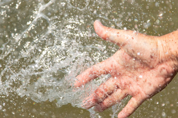 hand in water