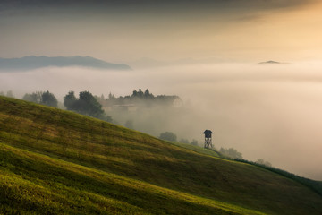 Naklejka na ściany i meble Foggy morning in Alps near Skofja Loka, Slovenia
