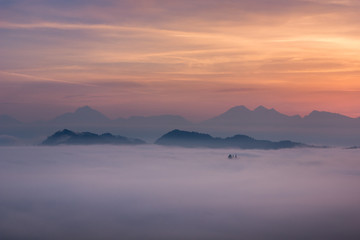 Foggy morning in Alps near Skofja Loka, Slovenia