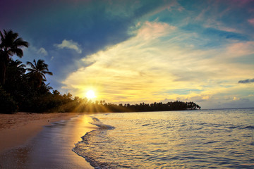 Colorful sunset on tropical beach.