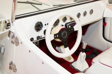 white closeup interior of ancient car vintage convertible