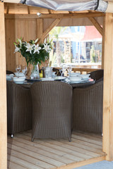 Patio furniture in a beautiful garden