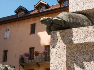bronze turtle fountain detail in the center of Annecy, France