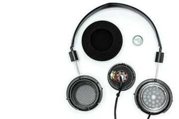 Broken earphones isolated on white background, Do it yourself or how to fix broken headphones concepts.