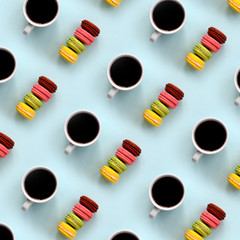 A pattern of many colorful dessert cake macaroon and coffee cups on trendy pastel blue background top view. Flat lay composition
