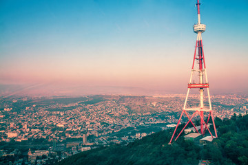 Aerial panoramic view of Tbilisi city at sunset - obrazy, fototapety, plakaty