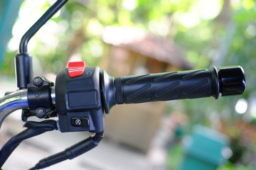 Horn switches, turn low-light, high-light and turn signal lights of motorcycle. Selective Focus.