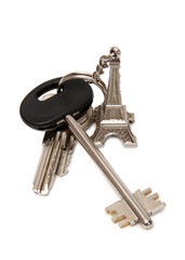Keychain and apartment keys on a white background
