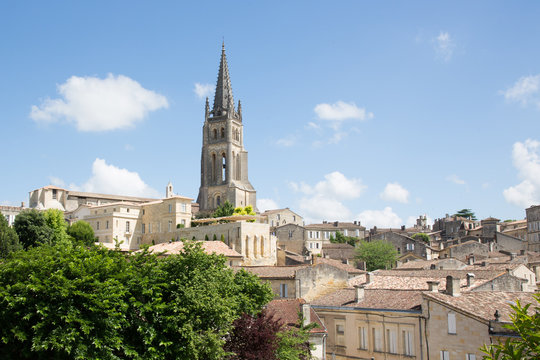 view of French village Saint Emilion dominated by spire of the monolithic church