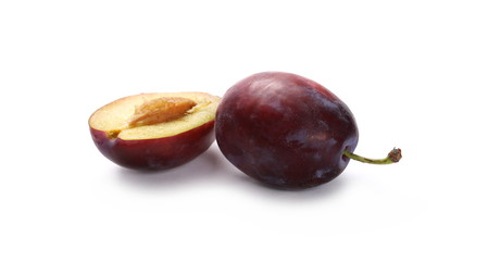 Fresh plums isolated on white background