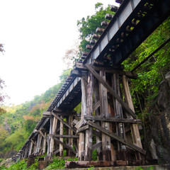 old wood structure of dead railways bridge