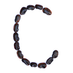 The letter C is made of beans. Symbol of the English alphabet of beans on a white background.