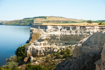 Fototapeta premium A beautiful photo of the nature of rocks and water. Cliff, ridge, canyon. Refuge, rest, relaxation, tourism. Cliff Stepan Razin, Russia, Saratov