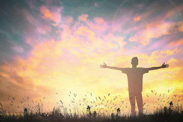 Happy man rise hand on morning view. Christian inspire praise God on good friday background. Now one man self confidence on peak open arms enjoying nature the sun concept world wisdom fun hope