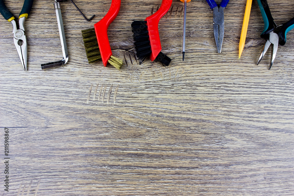 Poster tools and instruments on a wooden table. empty space for text