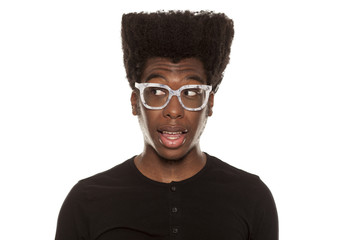 portrait of young thoughtful handsome afro american guy stylish hipster, isolated on white background