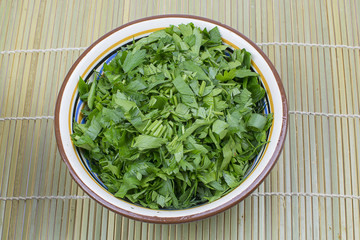 green fresh seasonings in a plate