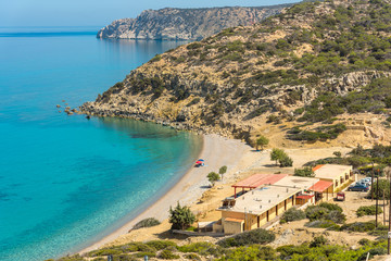 View direction south-east coast on Gavdos, to the beach of Korfos with guest house and tavernas