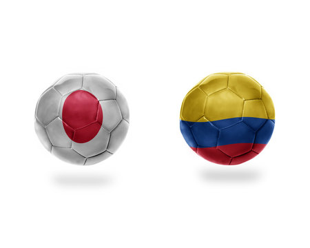 football balls with national flags of japan and colombia.