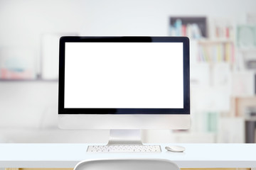 Mockup Blank screen desktop computer on white table. white screen computer for graphic display montage