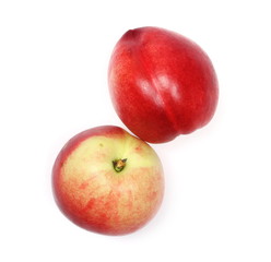 Fresh ripe peaches isolated on white background, top view