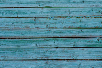 Obraz premium Grunge wooden background - old boards painted in blue color