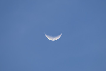 Crescent moon..Moon on January 22,2018 evening with natural blue sky background from phuket thailand.. © sbw19