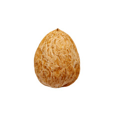 Single walnut on a white