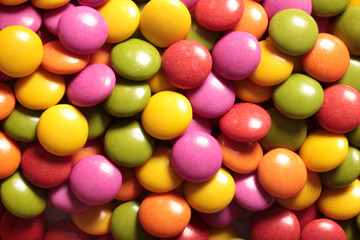 Fototapeta na wymiar Colorful chocolate candies background