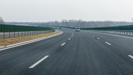 Cars on three line highway