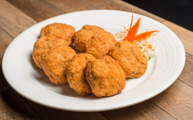 Thai Food Fried Shrimp Cake (Tod Mun Kung) on white plate