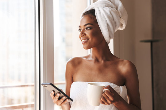 Pretty African Woman Wrapped In A Towel