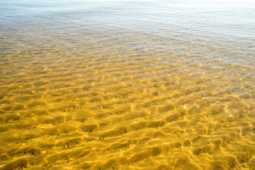 Water of the sea with sun reflections