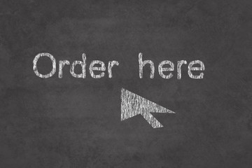 Order here sign on the school chalkboard