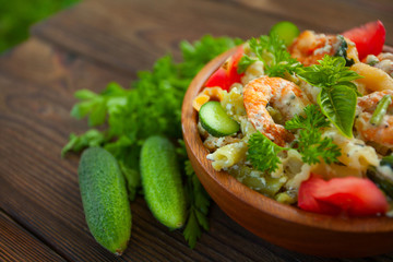  delicious gigli t with shrimps and basil on  plate