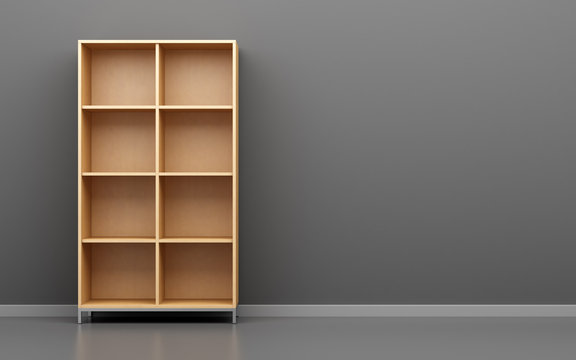 wooden office cabinet shelf in front of gray wall
