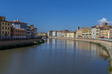 Naklejka na ściany i meble Old Town of pisa at the Arno river