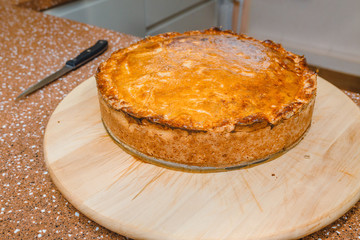 DeliciousPie with on a kitchen table.