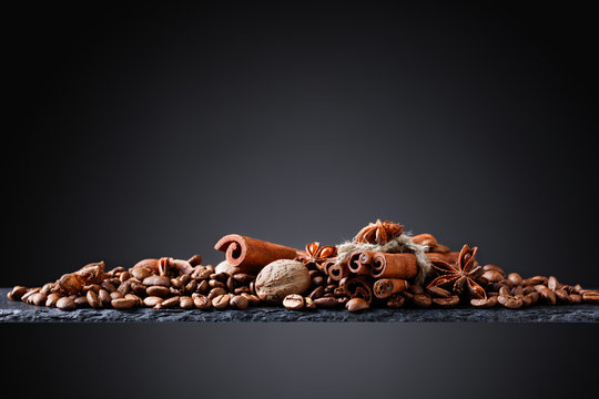 Fototapeta Roasted coffee beans with spices .