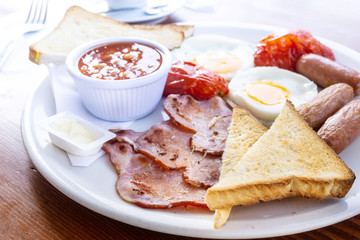 Egg and Toast - classical english breakfast with egg and ham