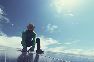 engineer team working on replacement solar panel in solar power plant;engineer and electrician team...