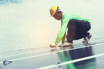 engineer team working on replacement solar panel in solar power plant;engineer and electrician team...