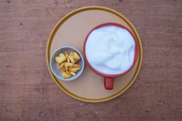 Hot fresh milk and biscuits breakfast for kid