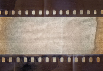 Vintage background with retro paper and old film strip