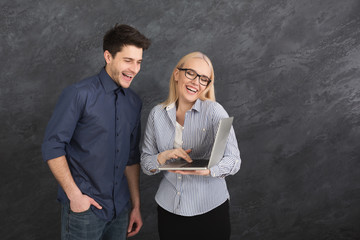 Couple shopping online with digital tablet